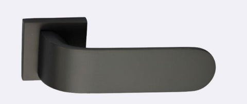 Dark gray door handle on a white background