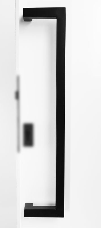 Black door handle on a white door