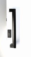 Black door handle and lock on a white door