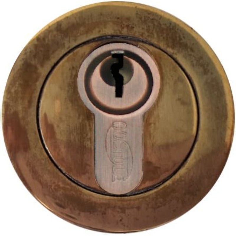 Bronze cylindrical lock on a white background