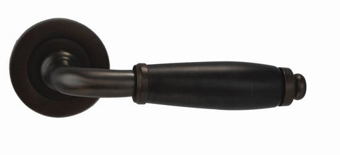 Bronze door handle on a white background