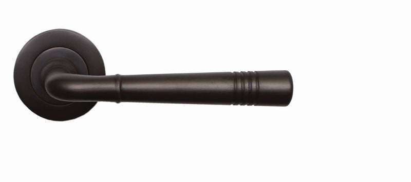 Dark bronze door handle on a white background