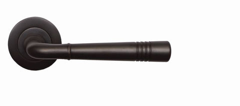 Dark bronze door handle on a white background