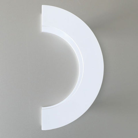 White semi-circular light fixture on a gray background