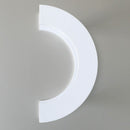 White semi-circular light fixture on a gray background