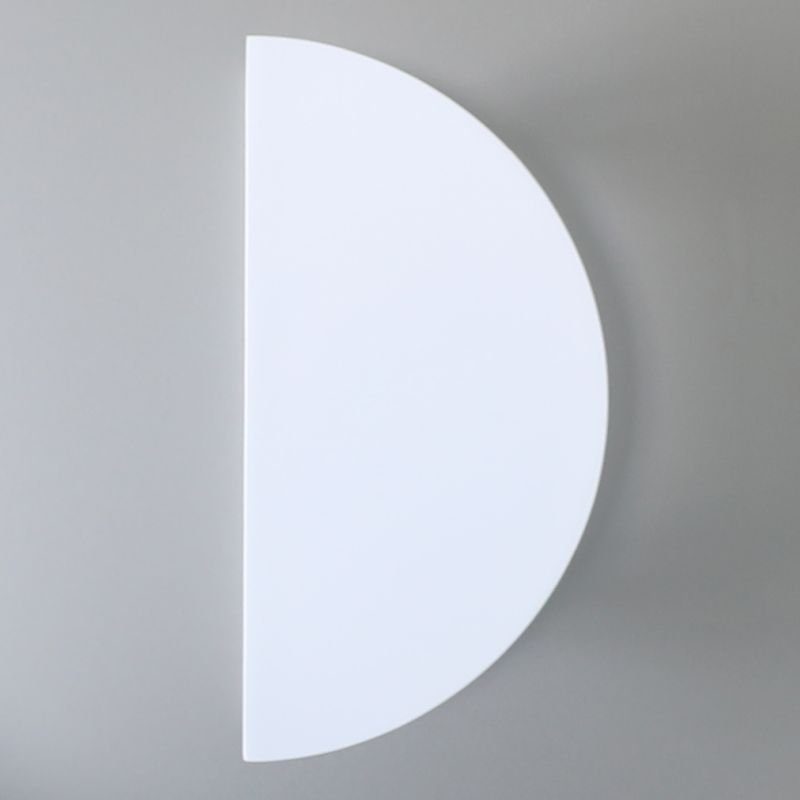 Half-circle light fixture on a gray background