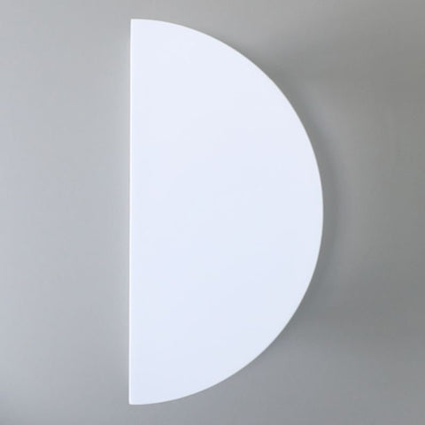 Half-circle light fixture on a gray background