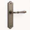 Vintage-style door handle on a white background
