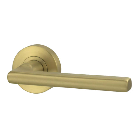 Gold door handle on a white background