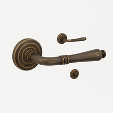 Zanda Winchester Balmain Door Lever on Round Rose – Rustic Brass