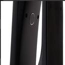 Close-up of a black electronic device with a circular component on a white background