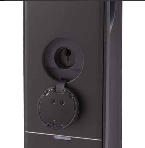 Close-up of a black door handle and lock mechanism on a white background