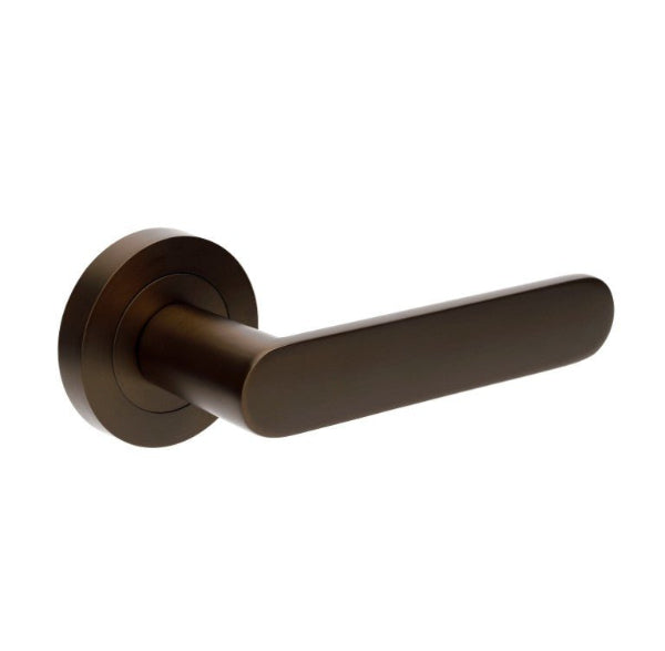 Bronze door handle on a white background
