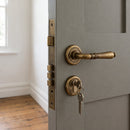 Zanda Winchester Balmain Door Levers for 9 Doors – Round Rose – Rustic Brass - primehardware