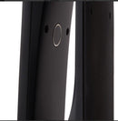 Close-up of a black electronic device with a circular component on a white background