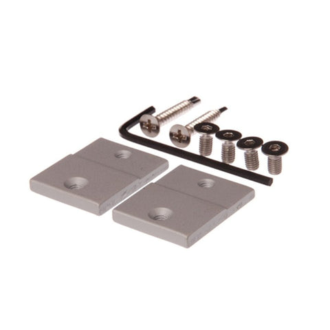 Two metal brackets with screws on a white background