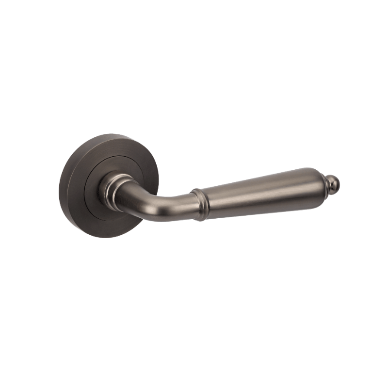 A single graphite nickel door handle with a rose fixing, in a sleek and modern style.
