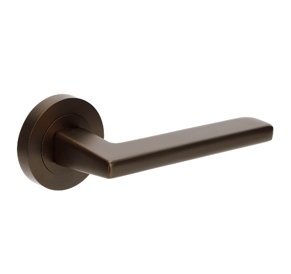 Bronze door handle on a white background