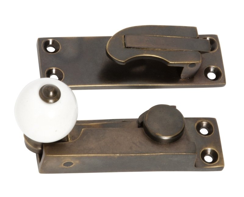 TRADCO SASH FASTENER PORCELAIN BALL ANTIQUE BRASS TD2301 - primehardware