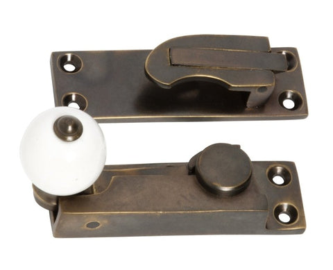 TRADCO SASH FASTENER PORCELAIN BALL ANTIQUE BRASS TD2301 - primehardware