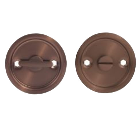 Two bronze door handles on a white background