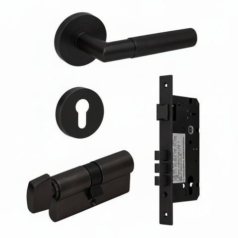 Bronze door handle set with lock components on a white background