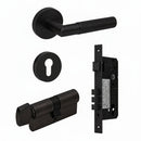 Bronze door handle set with lock components on a white background