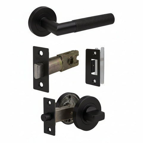 A set of bronze-finished door hardware components on a plain white background, including a lever handle, latch mechanism, lock plate, and deadbolt assembly.