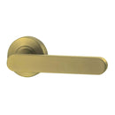 Gold door handle on a white background