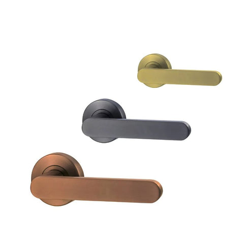 Three door handles in gold, black, and bronze on a white background