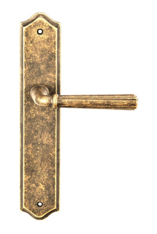 Vintage-style brass door handle on a white background