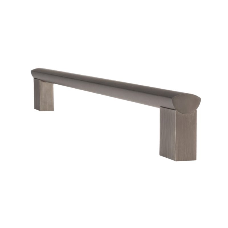 Cabinet handle with a brushed metal finish on a white background