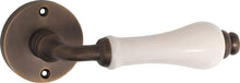 Tradco Exeter Porcelain Door Lever on Round Rose | 3 Finishes Available
