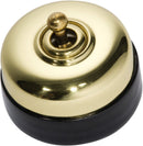 TRADCO BLACK PORCELAIN BASE SWITCH POLISHED BRASS