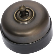 Tradco Black Porcelain Base Switch Polished Brass